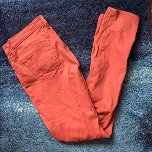 AG stretchy rust jeans